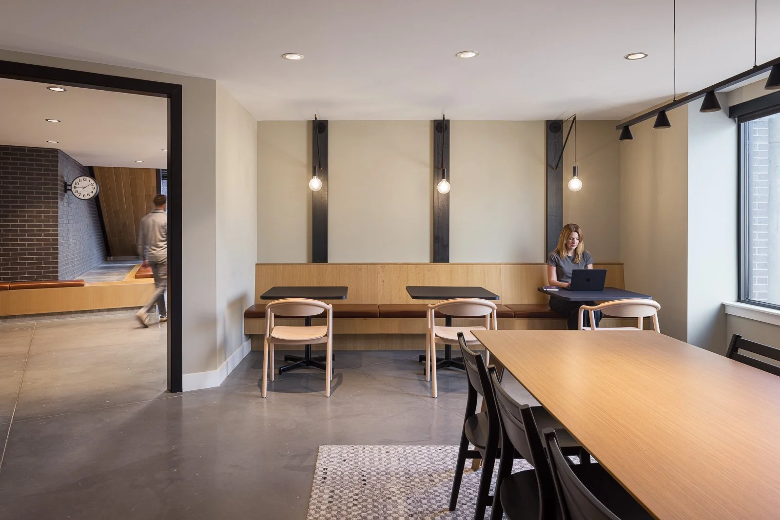 Wall and floor finish detail highlighting textures and commercial architectural design at Tracks.