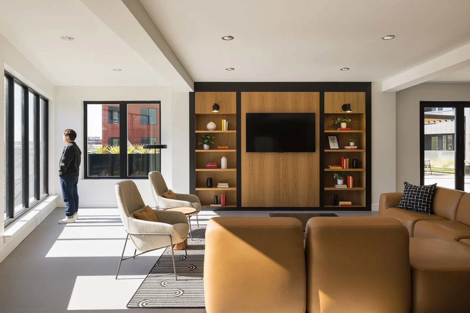 Corridor view capturing perspective, depth, and rhythm in Tracks interior photography.