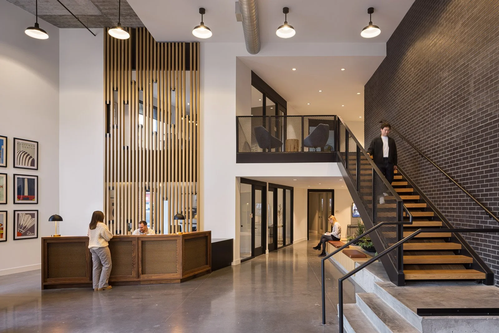 Wide interior view of Tracks commercial space highlighting natural light, open layout, and circulation in architectural photography.