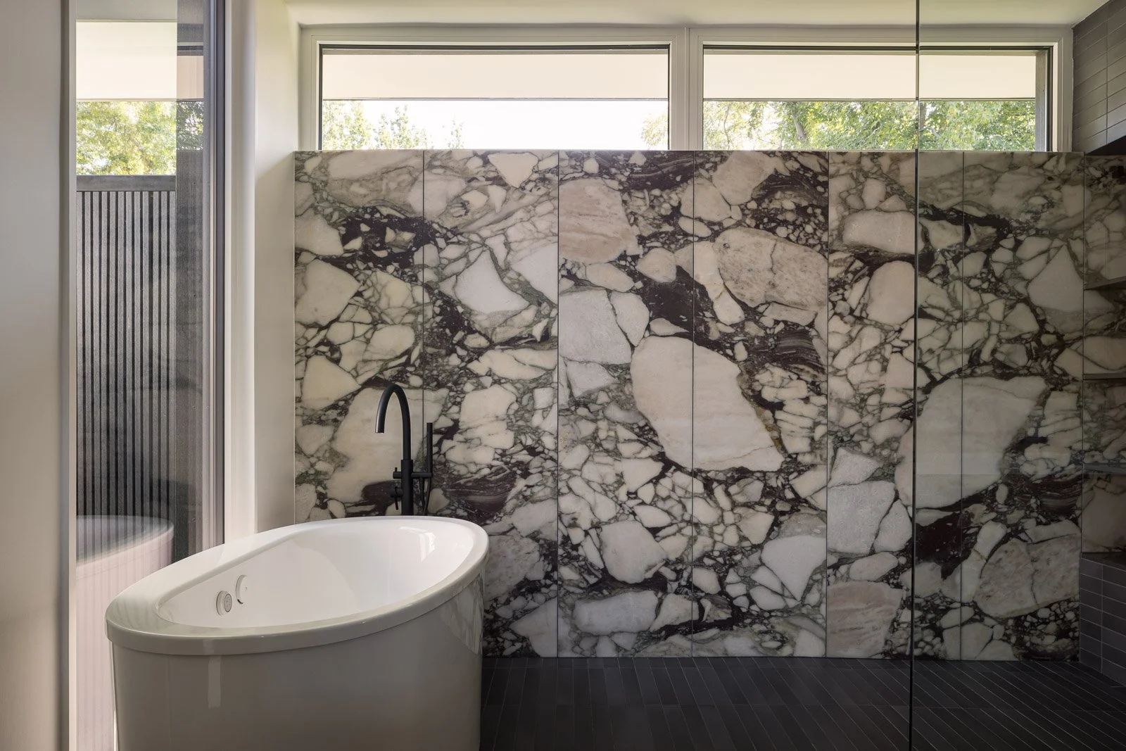 Interior living area at Prairie Light featuring open layout, natural light, and architectural design