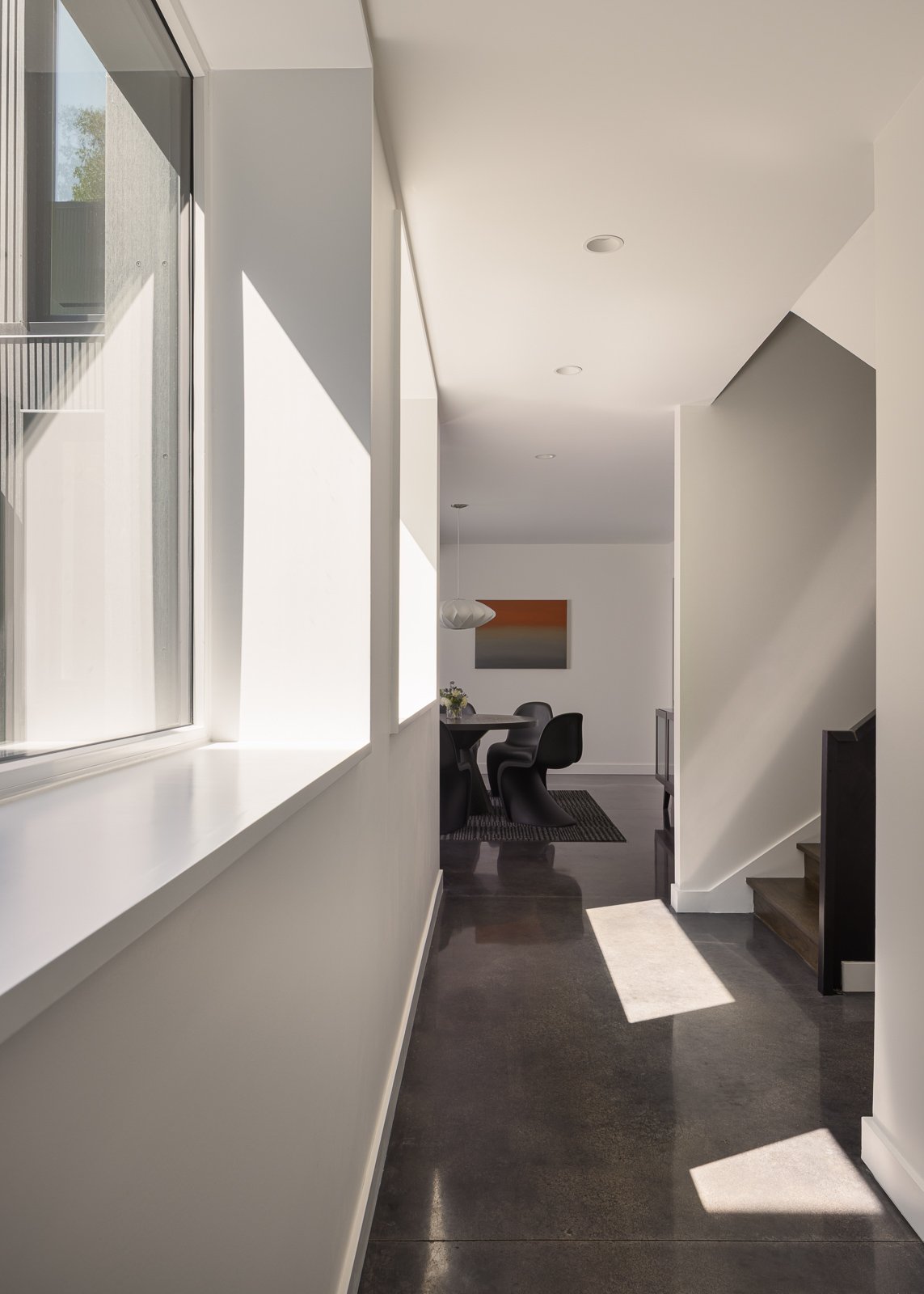 Interior hallway at Prairie Light capturing spatial perspective, lighting, and architectural features