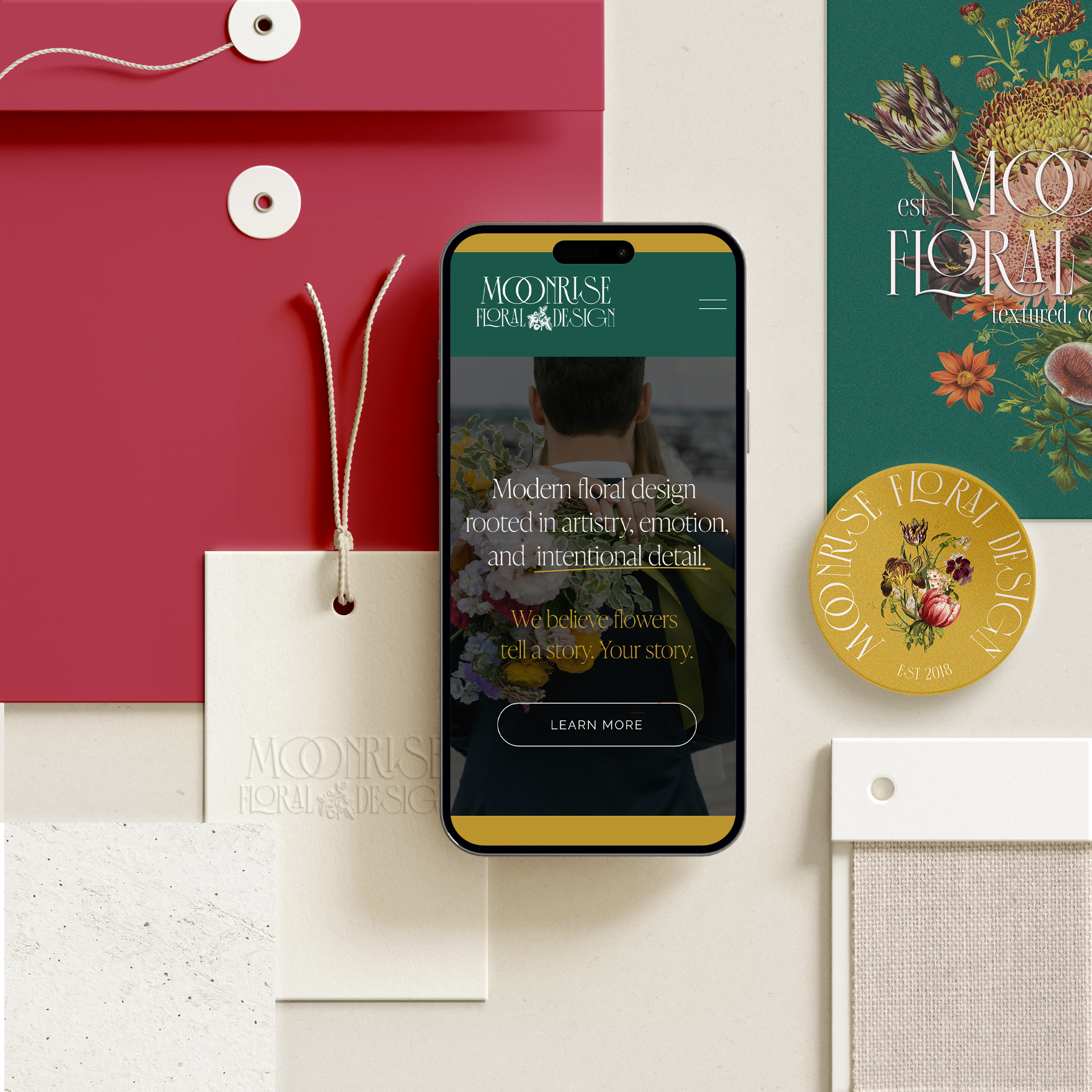 Flat lay of floral design branding materials for Moonrise Floral Design, wedding florist based in Rochester NY.