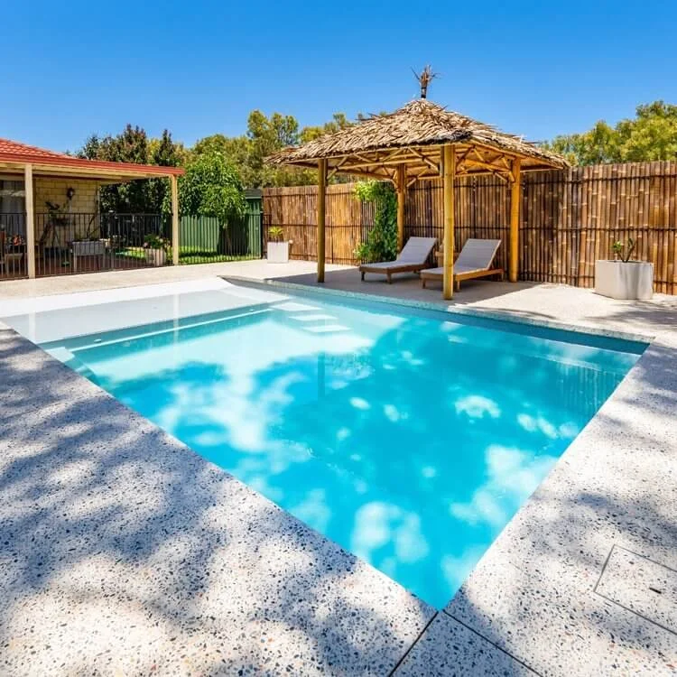 Freedom Pools Beach Pool with bamboo gazebo and outdoor entertaining area - available through Plungeit Pools Queensland