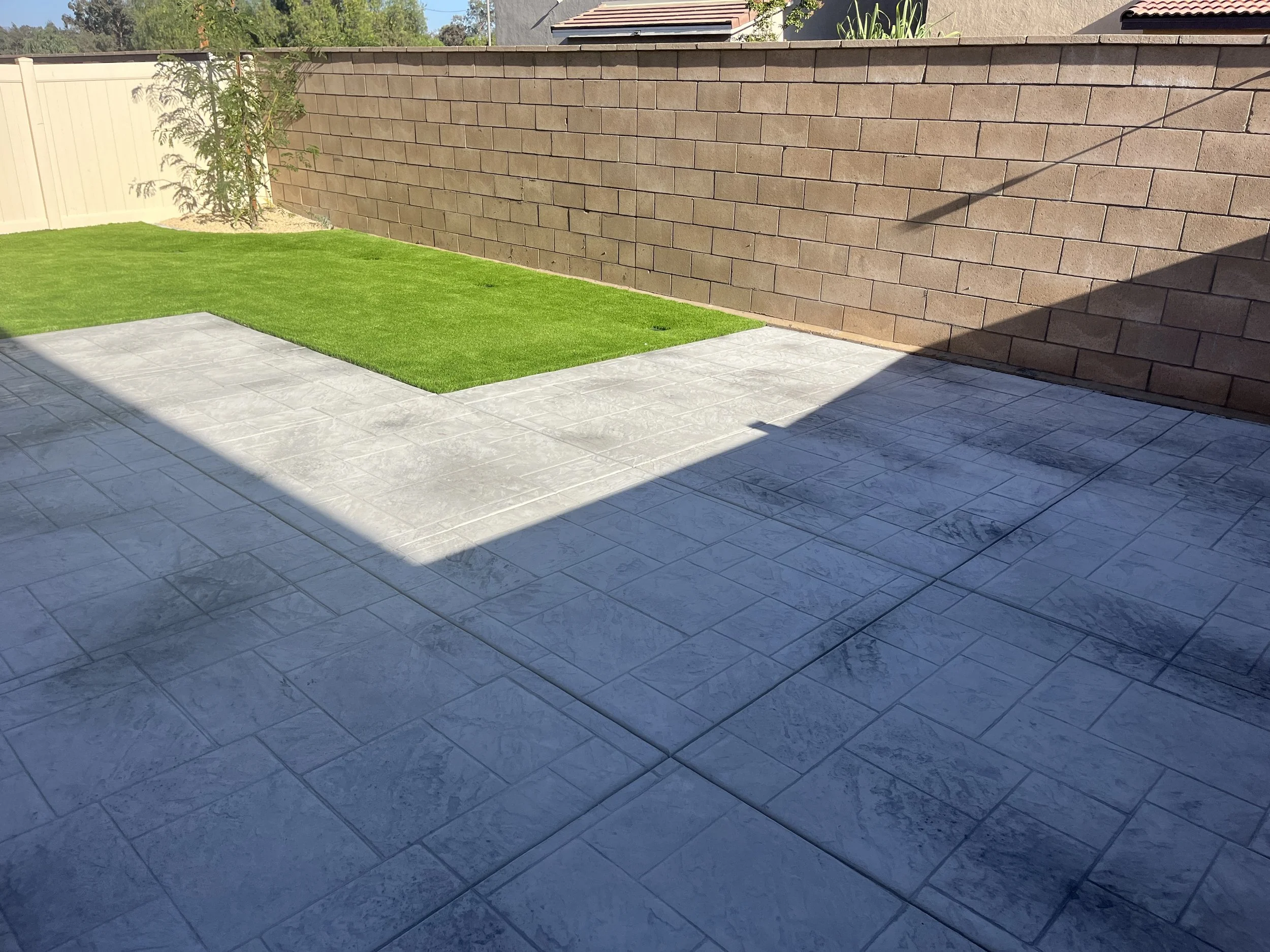 Concrete patio with artificial turf yard upgrade in Menifee CA