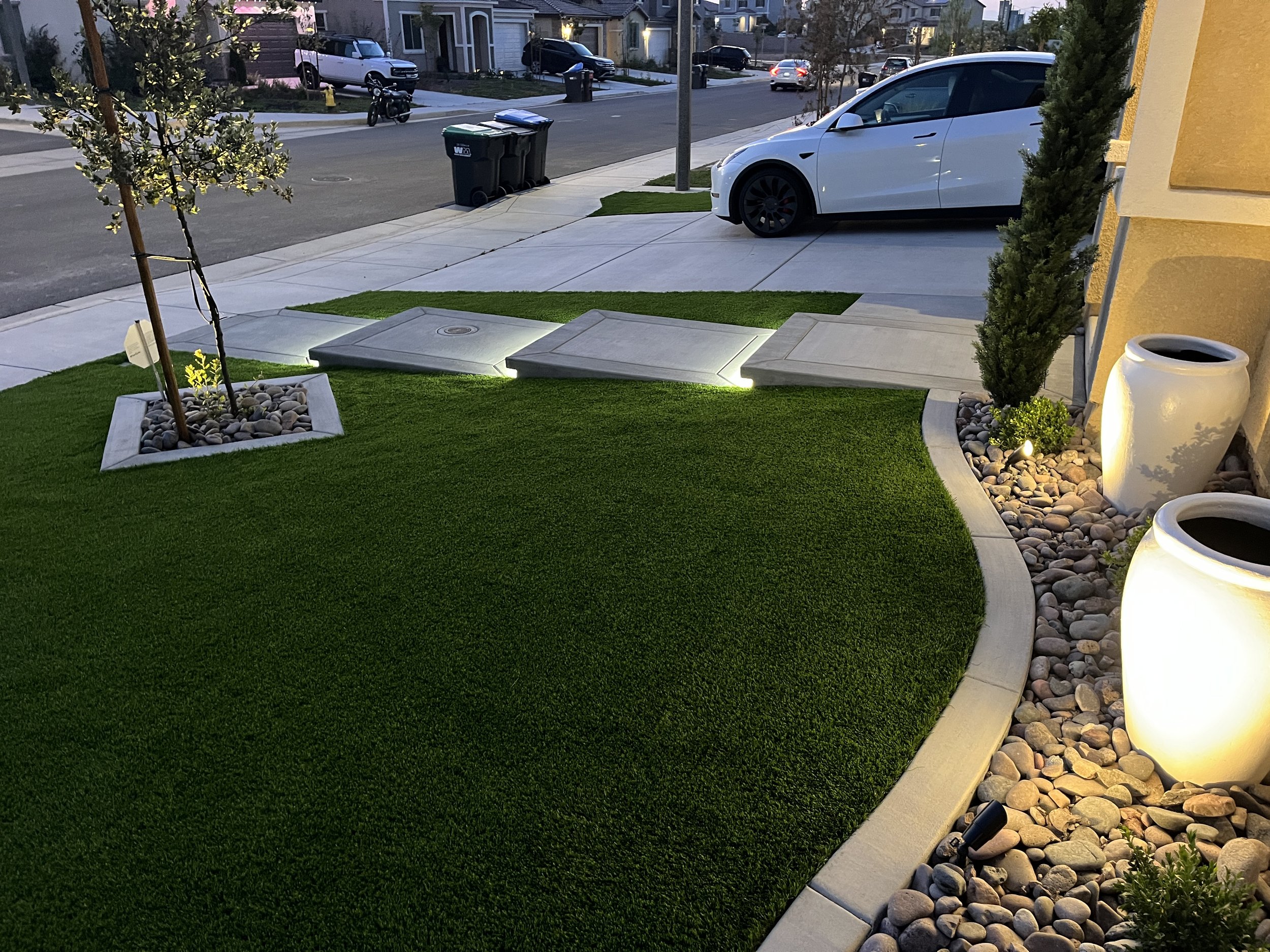 Close-up of custom concrete step with integrated LED lighting detail in Murrieta, CA.