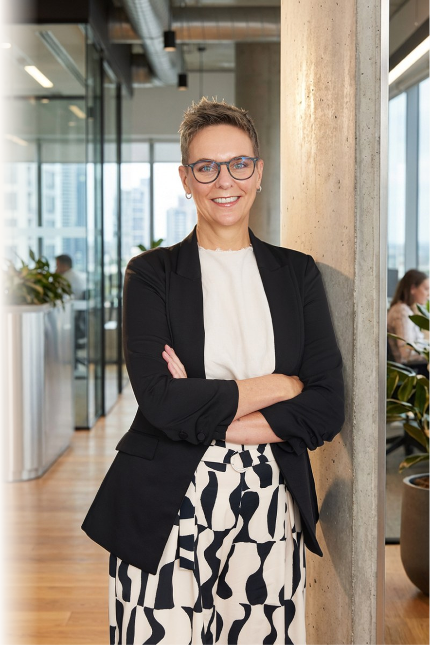 Portrait of Jennifer Hookham smiling at the camera.