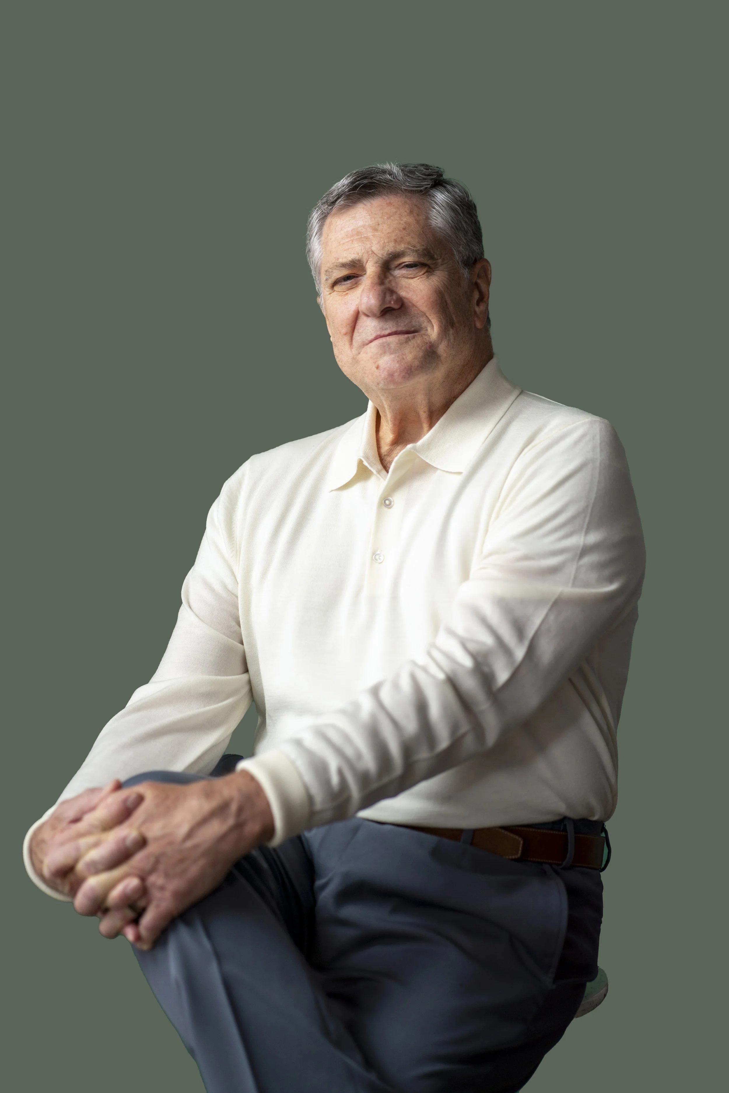 Charles Penot, Jungian life coach for men, seated in a relaxed pose