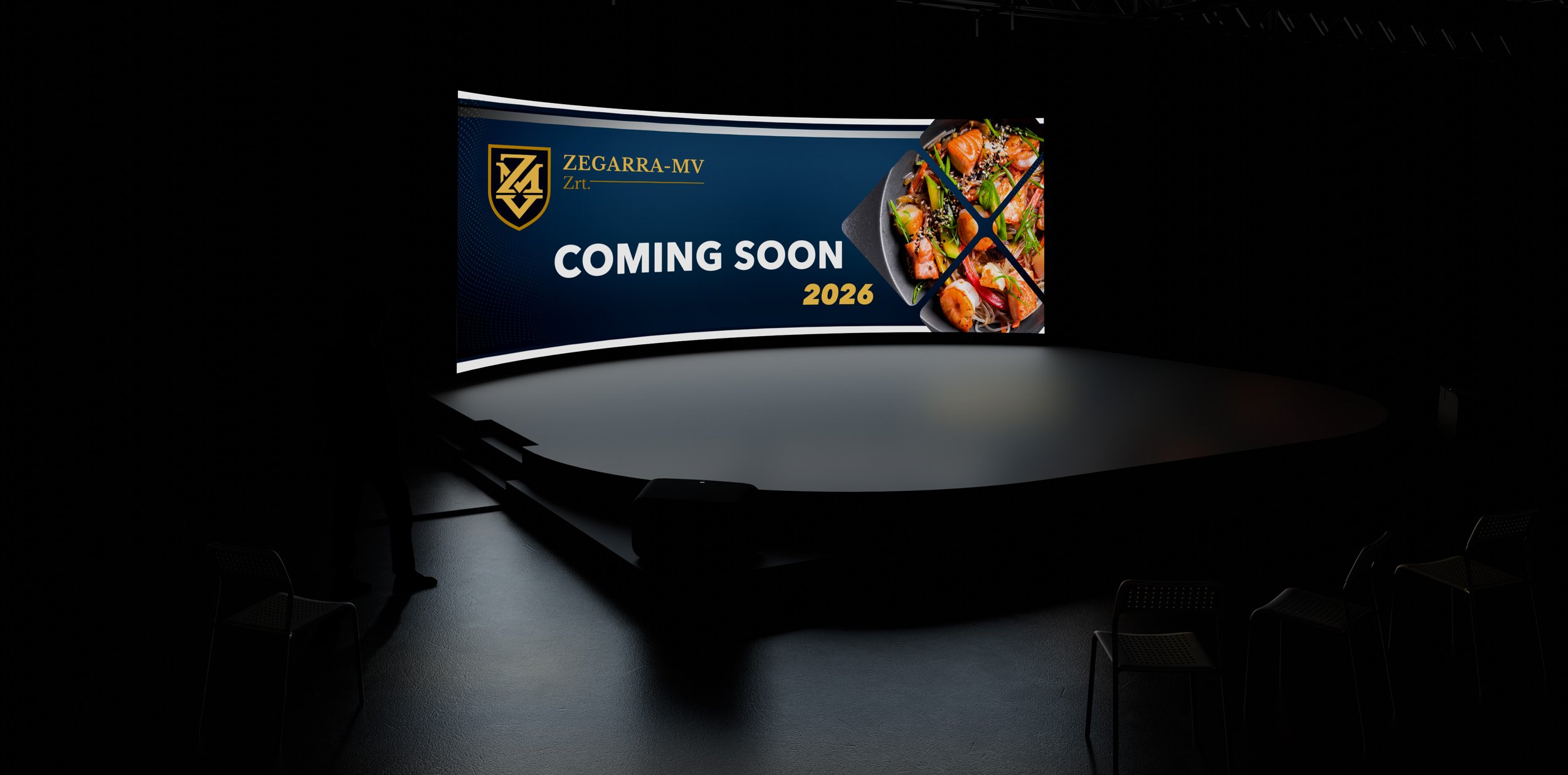An empty presentation stage with a large screen displaying an announcement that says 'COMING SOON 2026' for ZEGARRA-MV, showcasing an image of a seafood dish.