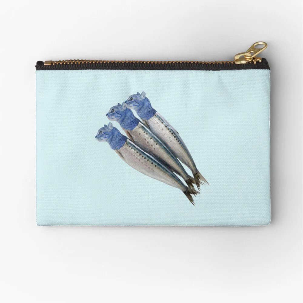 Light blue zippered pouch with a print of three fish with blue cat heads on the front.