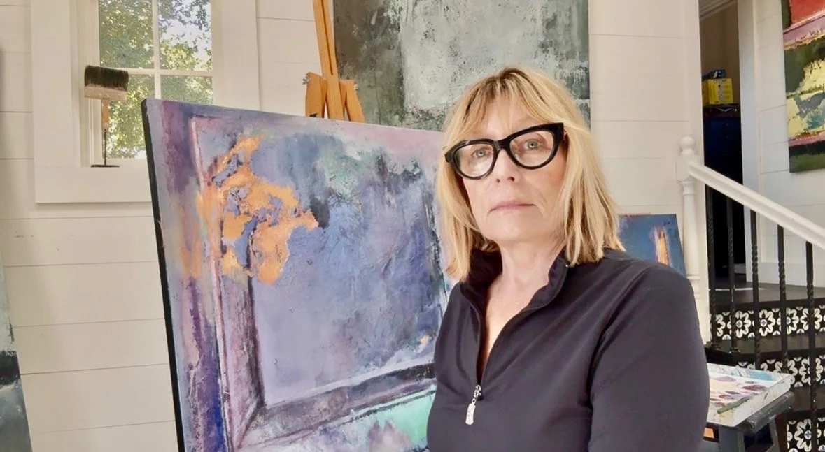 An image of Anne in front of her painting to explain her 3rd principle in terms of painting.