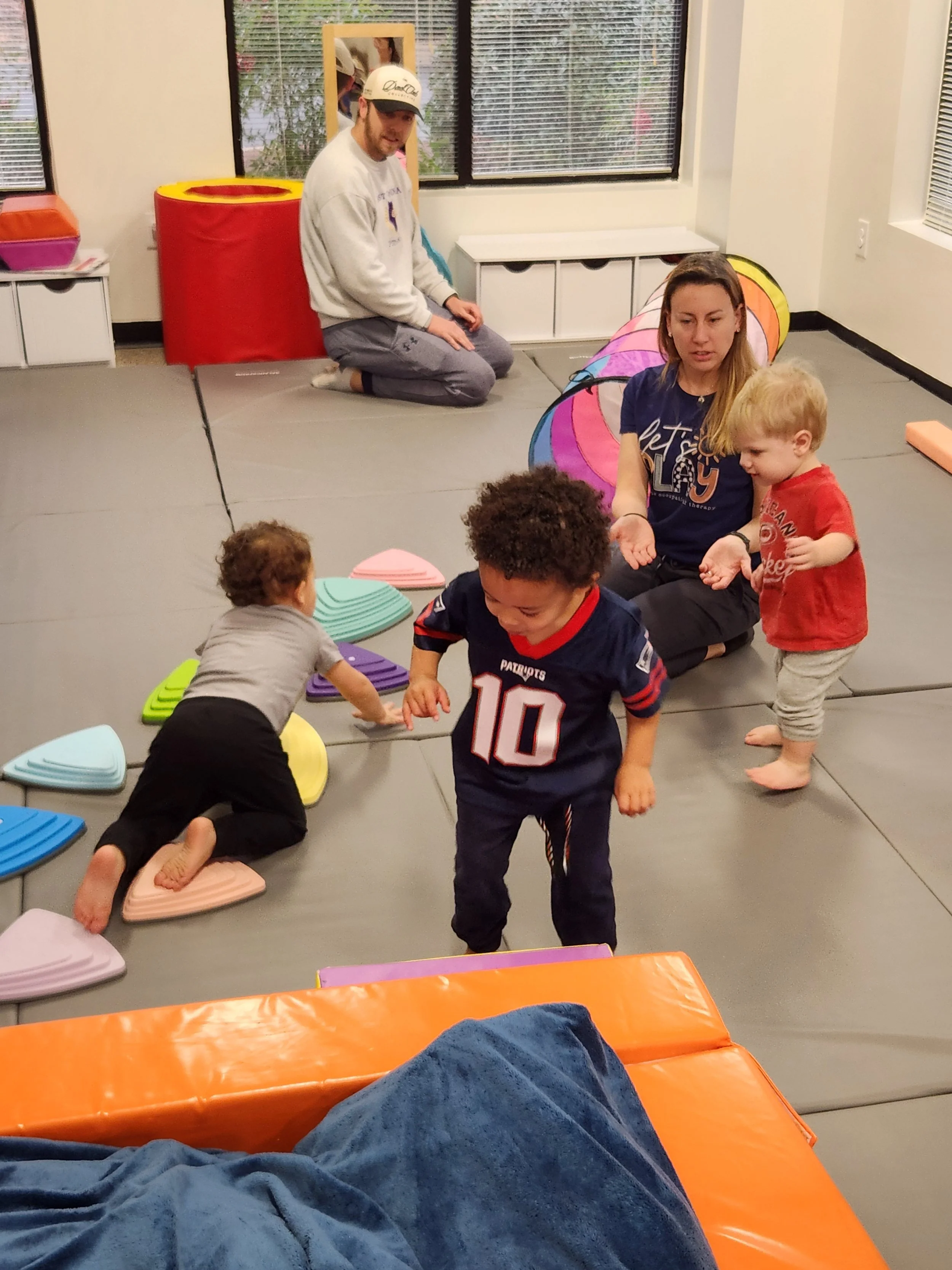 kids playing with teacher