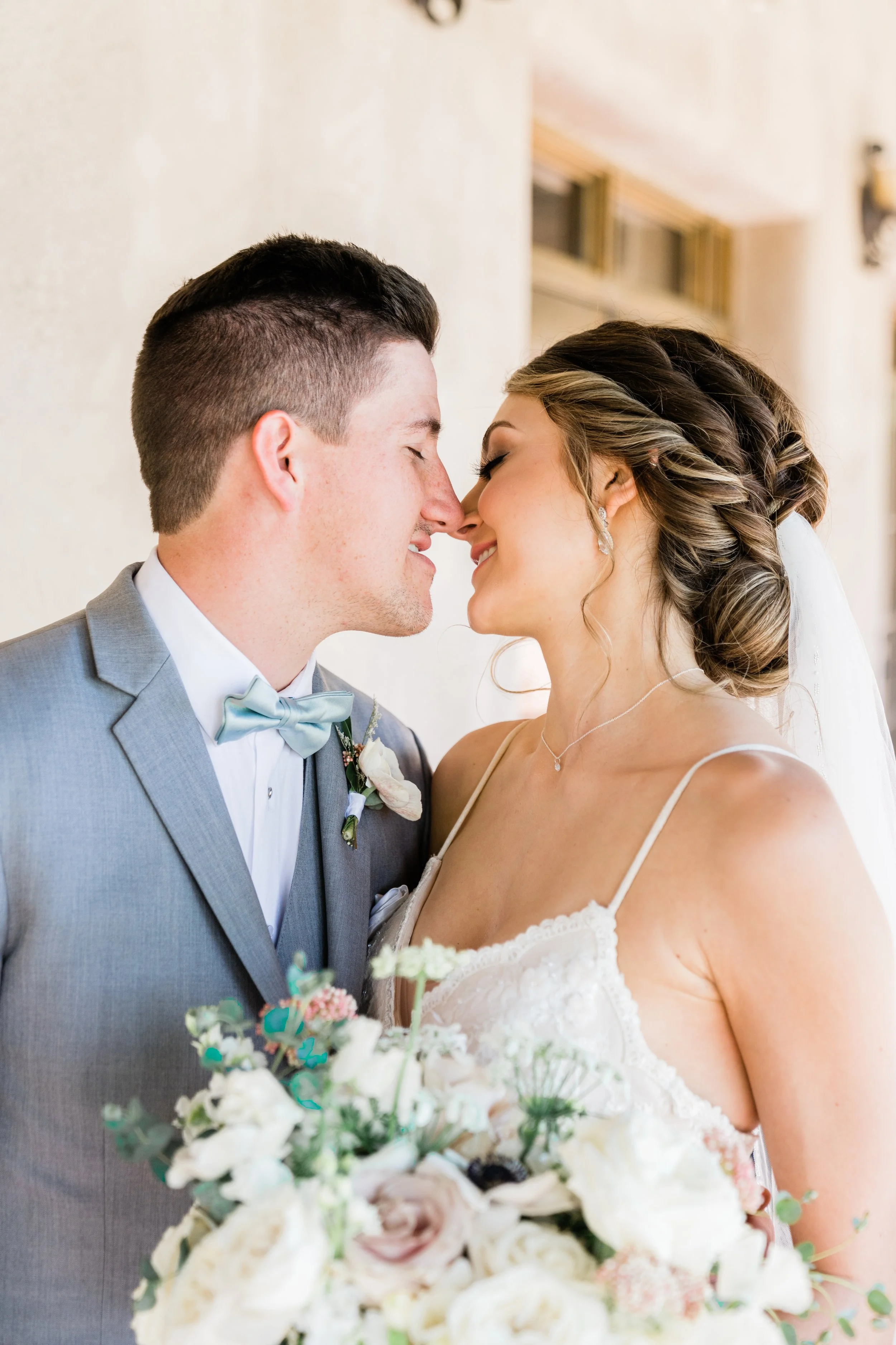 Amelia Thorp Hair & Makeup in Phoenix does a  timeless updo for a bride in Scottsdale, Arizona. Photo by Laura Horner Photography