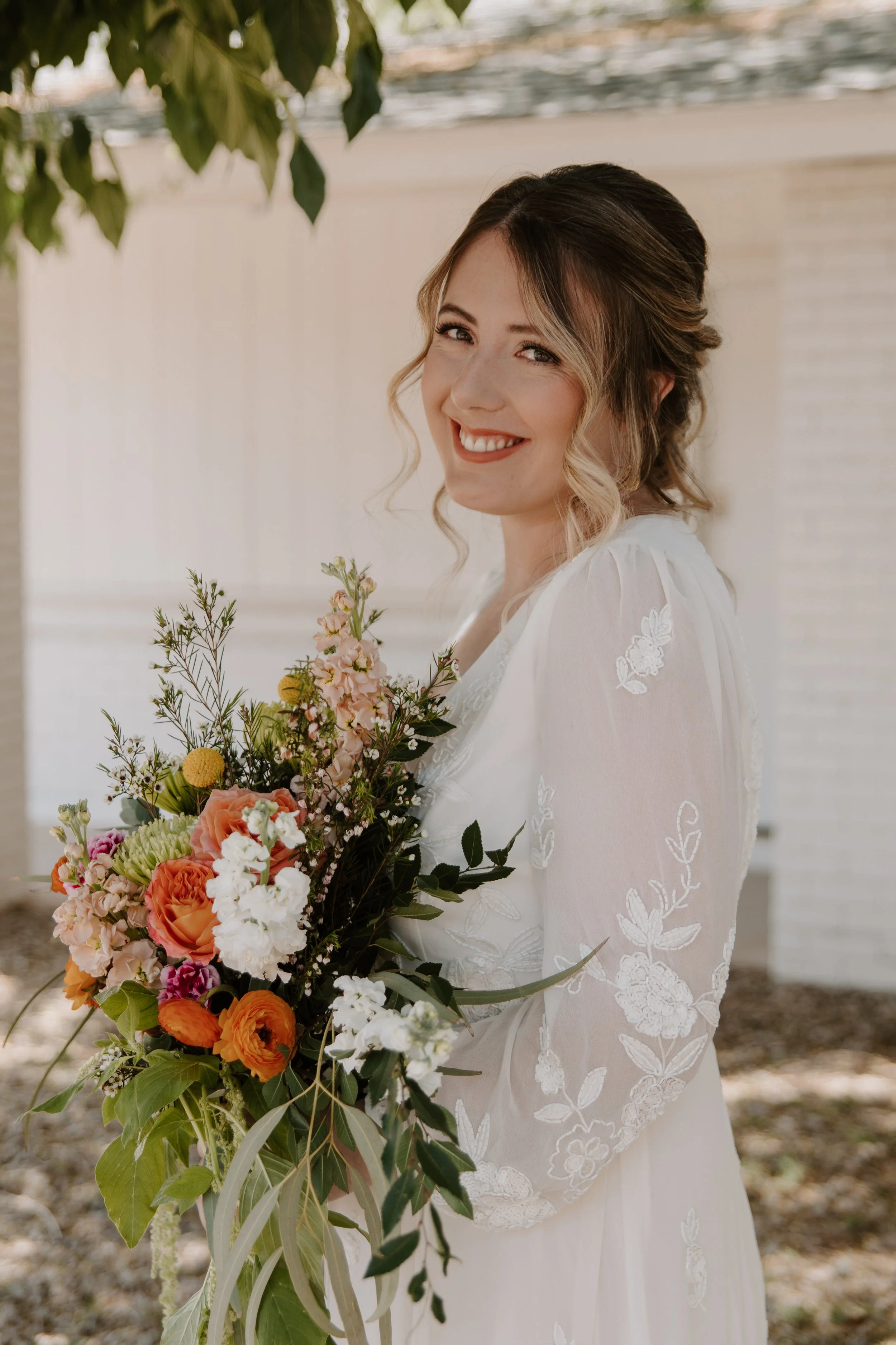 Amelia Thorp Hair & Makeup in Phoenix does a  romantic updo and soft makeup for a bride in Scottsdale, Arizona.