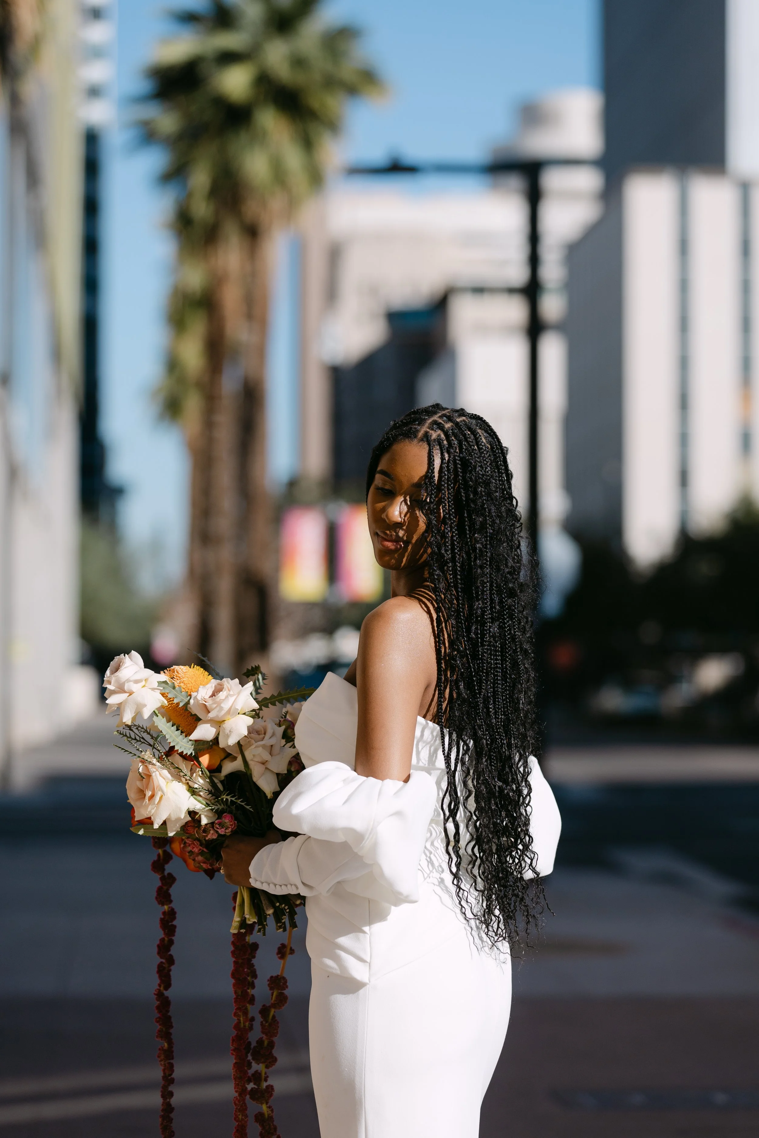 Amelia Thorp Hair & Makeup in Phoenix does makeup for a bride with dark skin in featuring soft glam with radiant finish at Monroe Street Abbey in Phoenix, Arizona. Photo by Mrs. Ferree Photography