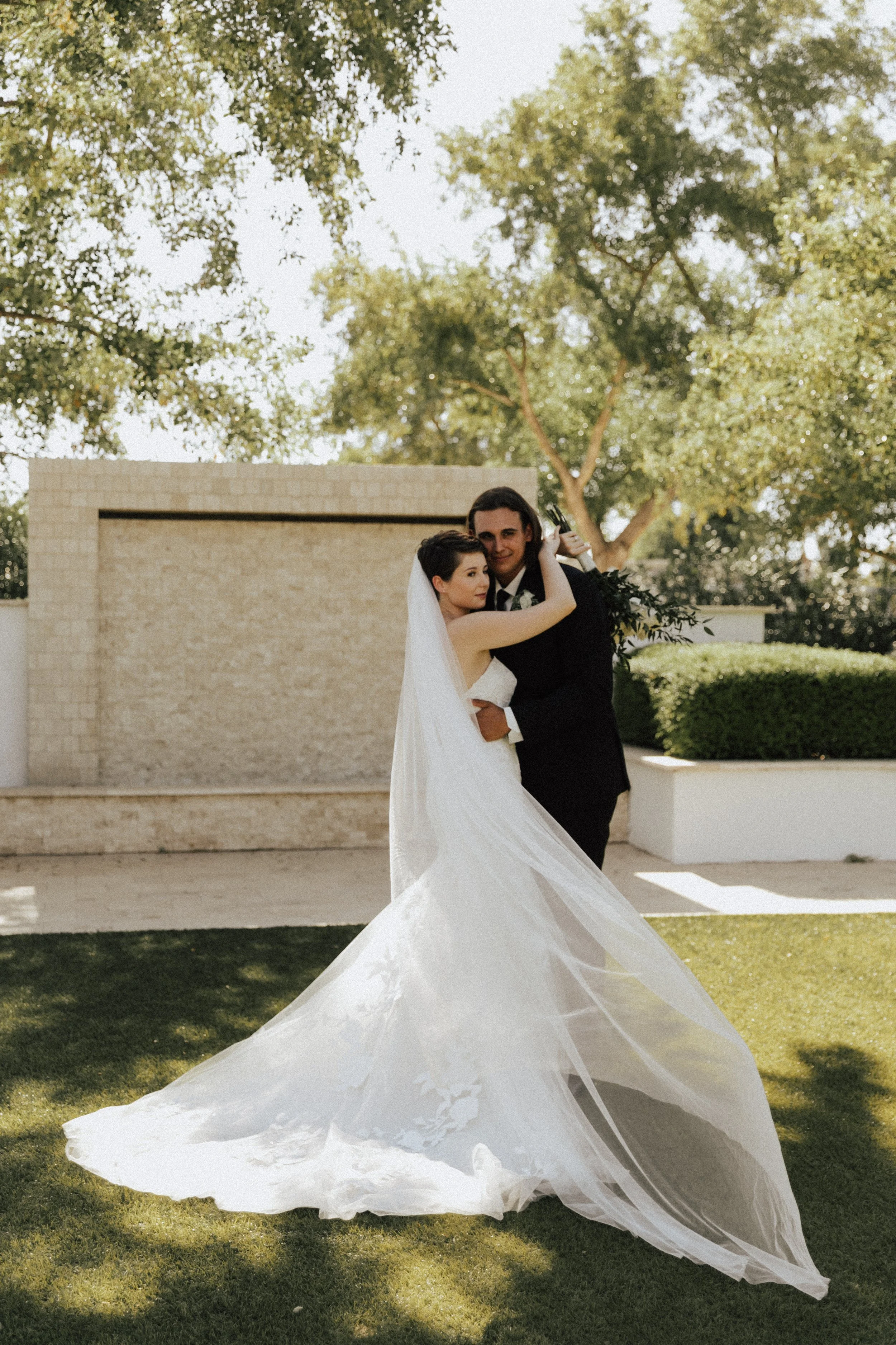 Amelia Thorp Hair & Makeup in Phoenix does a  timeless hair and makeup look for a bride with a pixie cut at Lindsay Grove in Mesa, Arizona. Photo by Emily Albright Photography