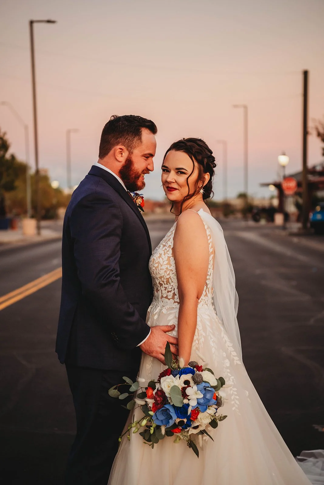 Amelia Thorp Hair & Makeup in Phoenix does a textured updo and soft makeup with pop for a bride in Phoenix, Arizona. Photo by Painted Desert Photography