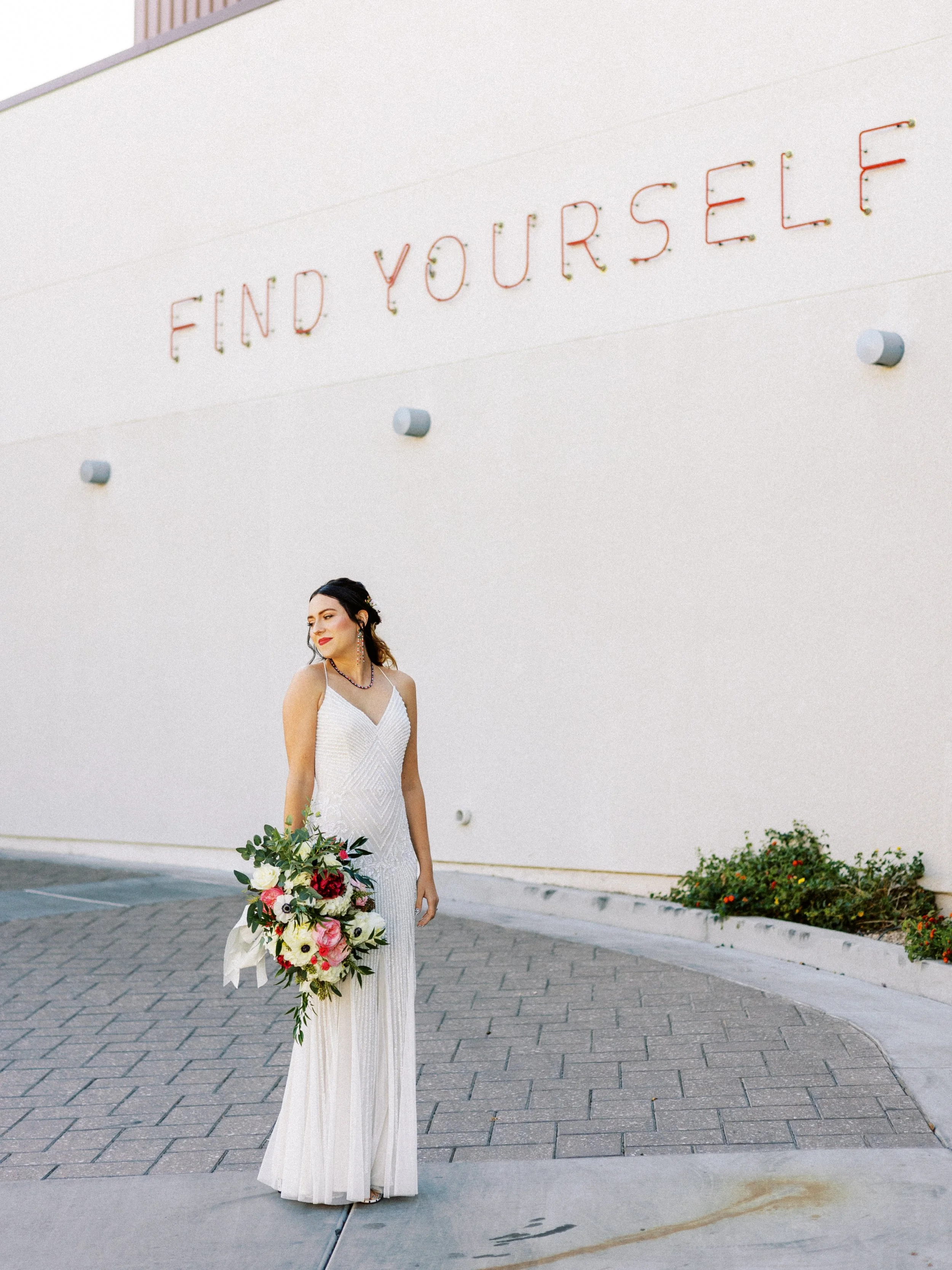 Amelia Thorp Hair & Makeup in Phoenix does a  romantic half up hairstyle on a bride in Downtown Phoenix, Arizona. Photo by Delight in the Desert Photography