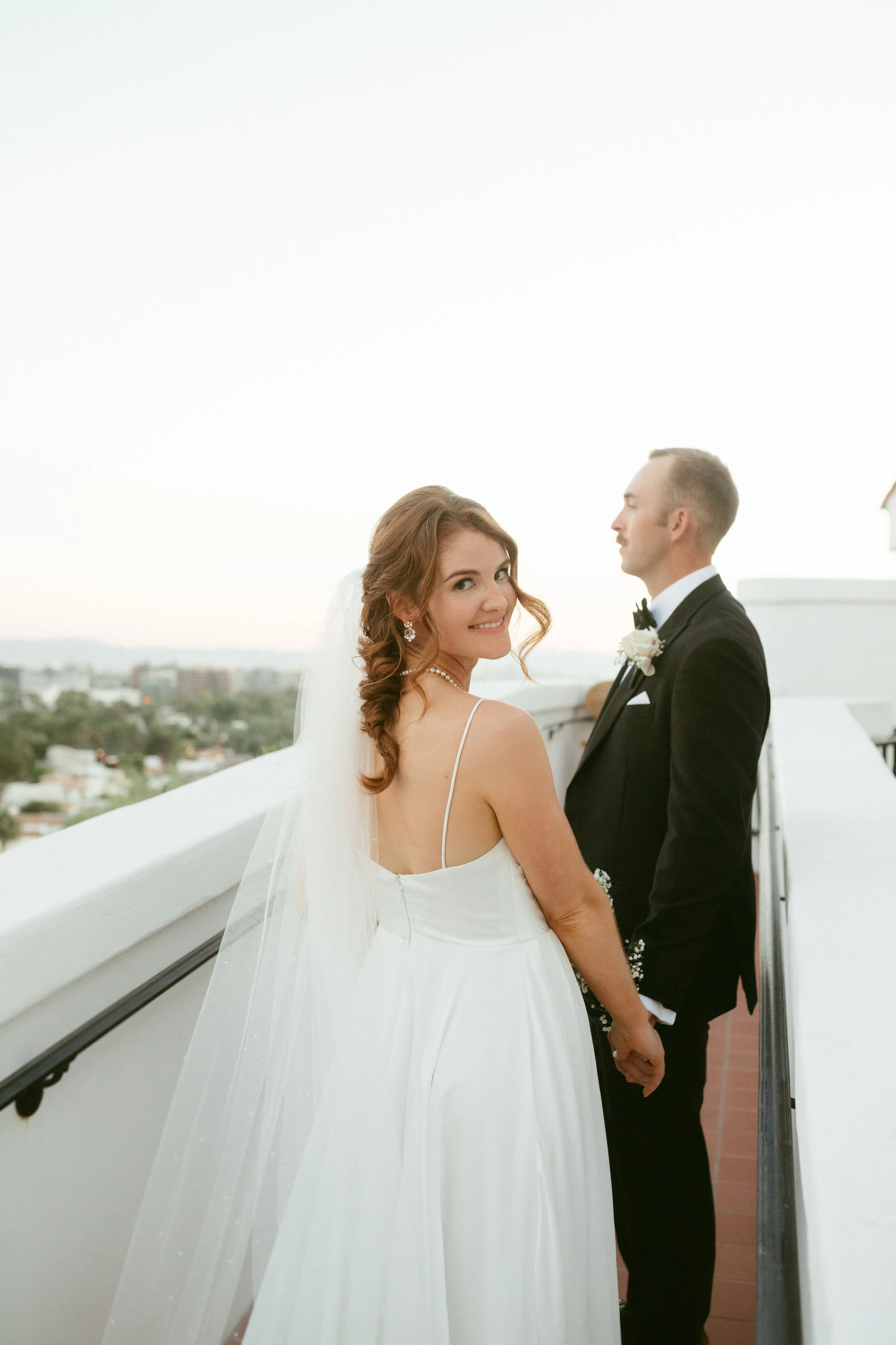 Amelia Thorp Hair & Makeup in Phoenix does a textured braid and soft makeup for bride getting married at Wrigley Mansion in Phoenix, Arizona. Photo by Hannah Mead Photography