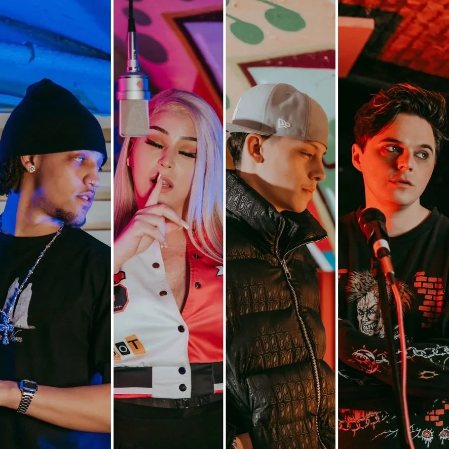 Four young people in a music studio or stage, each in a separate section of the image, with colorful lighting. The first person is a man with a black beanie, jewelry, and a black t-shirt. The second is a woman with long blonde hair, in a colorful jacket, touching her finger to her lips. The third is a man in a gray cap and black jacket, looking downward. The fourth is a man with short dark hair, sitting near a microphone, with a red and black lighting background.