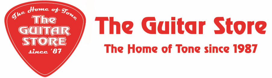 Logo for The Guitar Store featuring a red guitar pick with white text that reads 'The Home of Tone since '87' and the store's name, along with large red text to the right stating 'The Guitar Store' and smaller red text underneath saying 'The Home of Tone since 1987'.