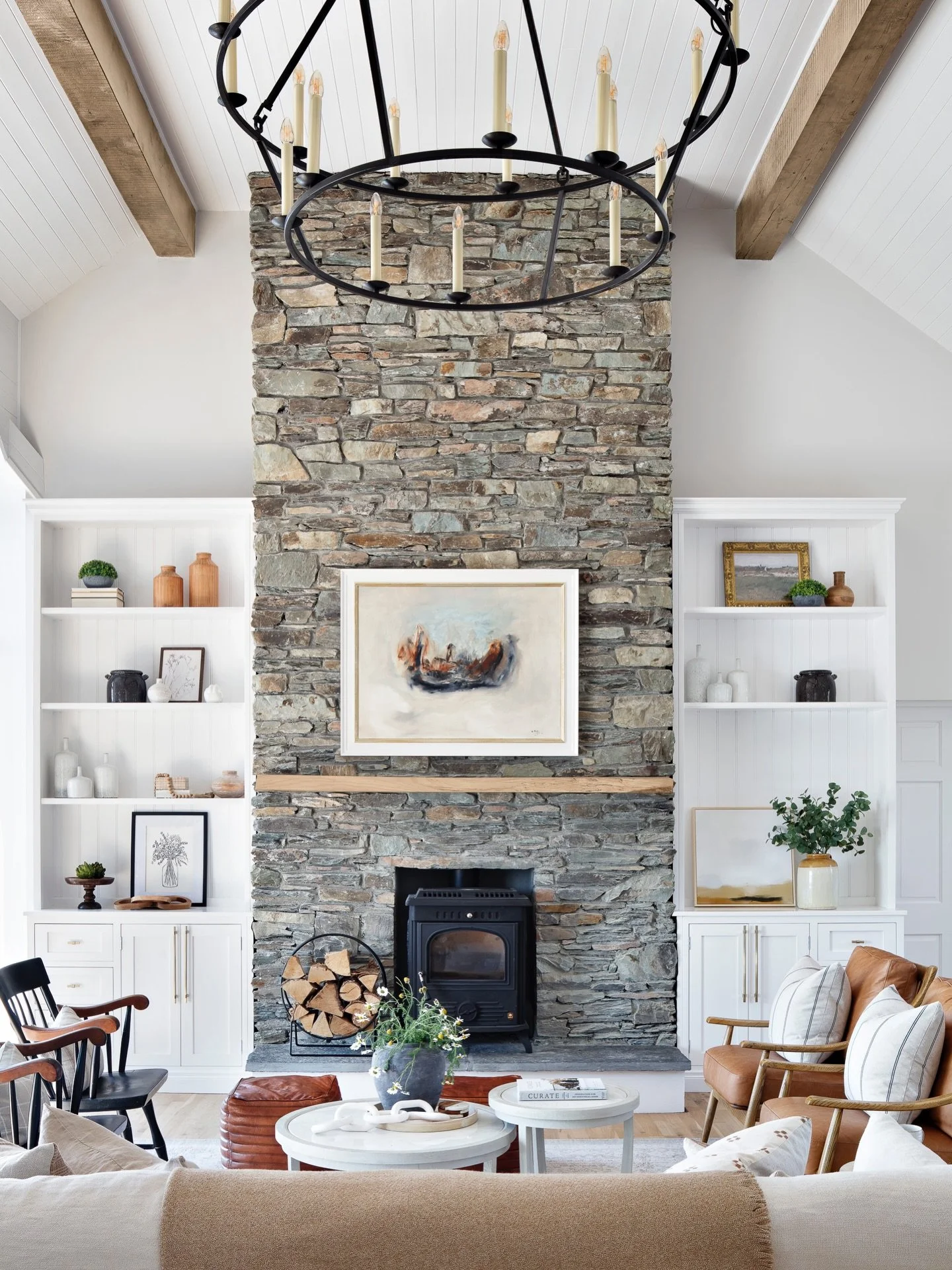 Project: St. Finian's Bay Residence
Location: Co Kerry, Ireland
Photographer: @jessglynnphoto 

For this space we focused on creating a living room that feels both grounded and inviting.

The natural stone fireplace anchors the room, while layered te