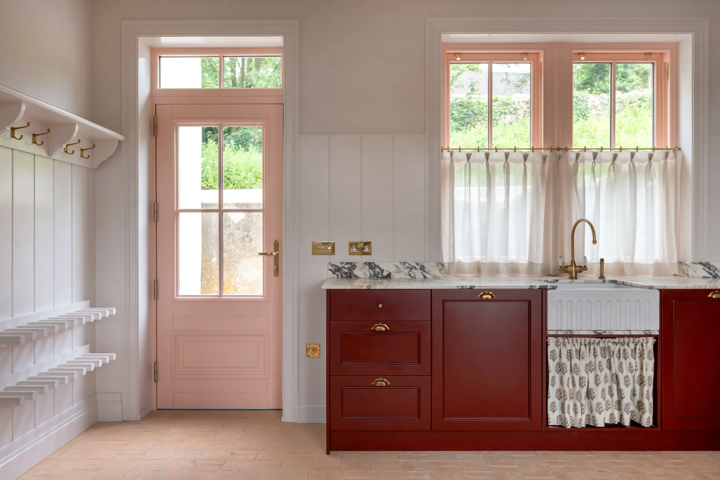 Completed kitchen at Deerpark Residence in Co. Clare by Aoife Maria Interiors, showing bespoke cabinetry, lighting, materials and furniture as part of a full-service interior design project.