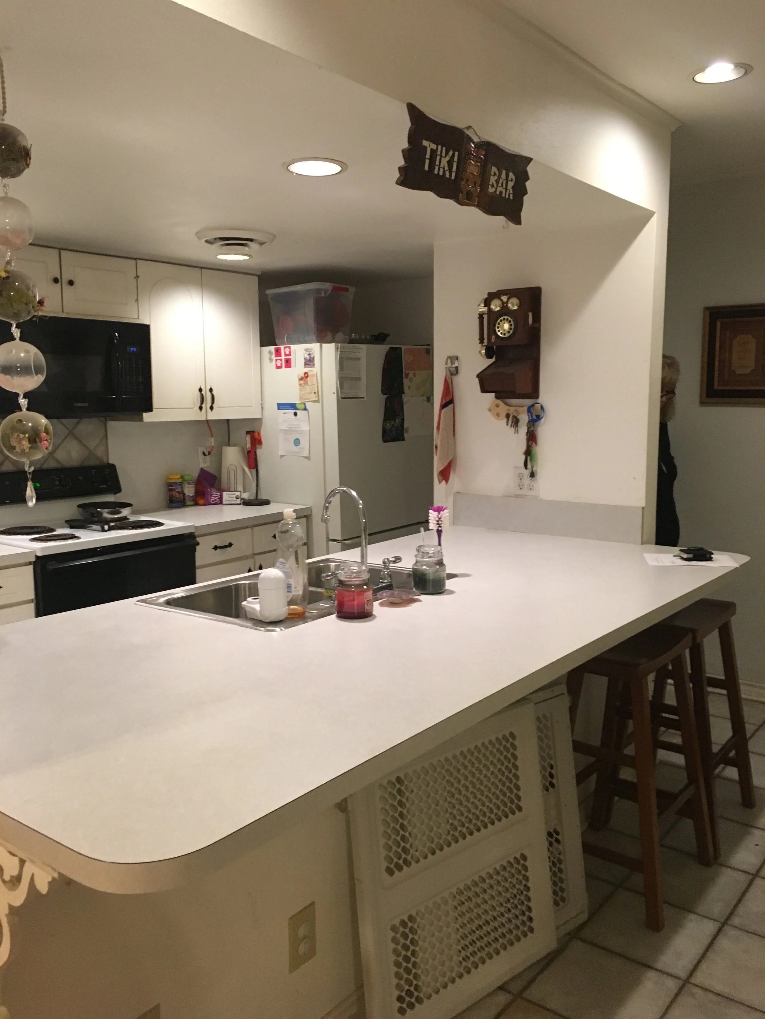 Kitchen: Previous layout prior to epoxy and cabinetry upgrades (Before)