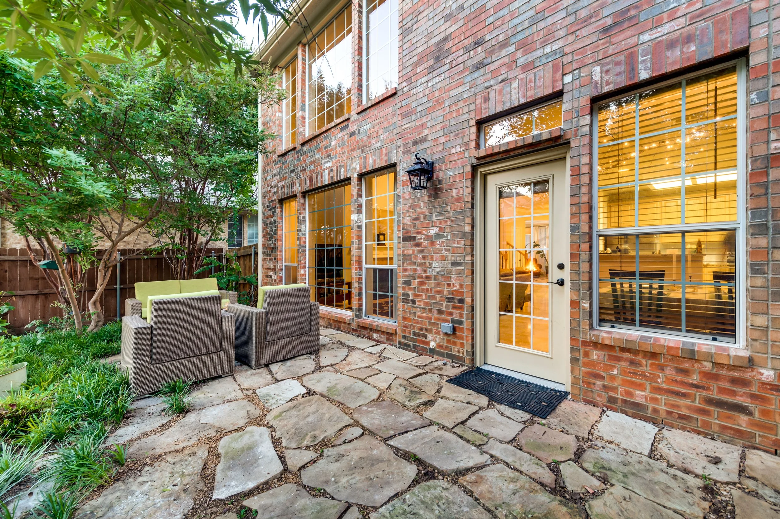 Landscape: Custom hardscaping, drought-tolerant plantings, and a refined outdoor living space