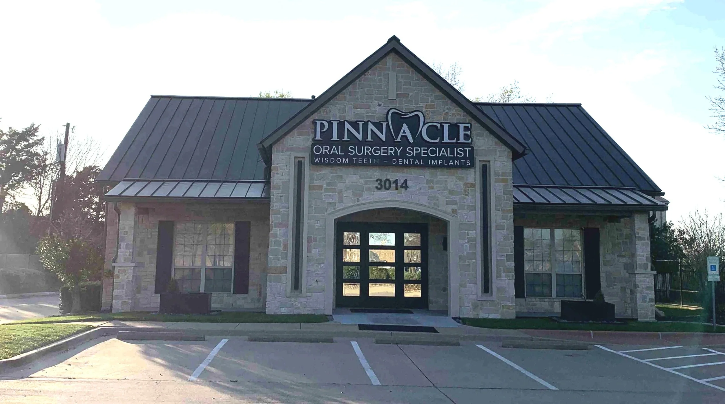 Pinnacle Oral Surgery Specialist: From dated to distinctive - this facade renovation transformation enhances curb appeal and strengthens the client's brand presence.