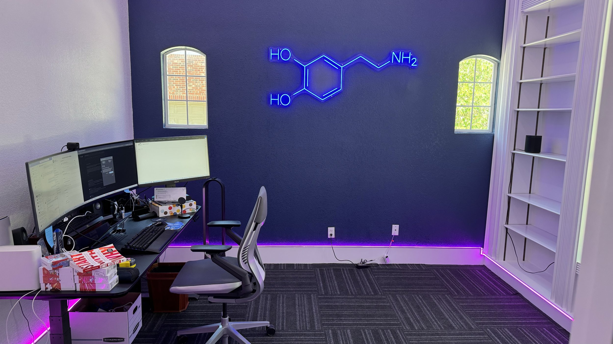 Study: Modernized workspace featuring integrated multi-color LED accent lighting, a  vibrant blue color palette to soothe the space, and an updated layout including new commercial lay-in carpet tiles