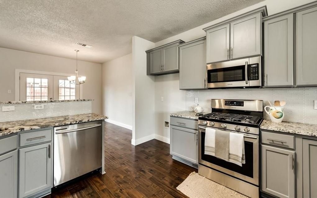 Kitchen: Modernized finishes with new appliances and integrated lighting to brighten the space for a more inviting atmosphere