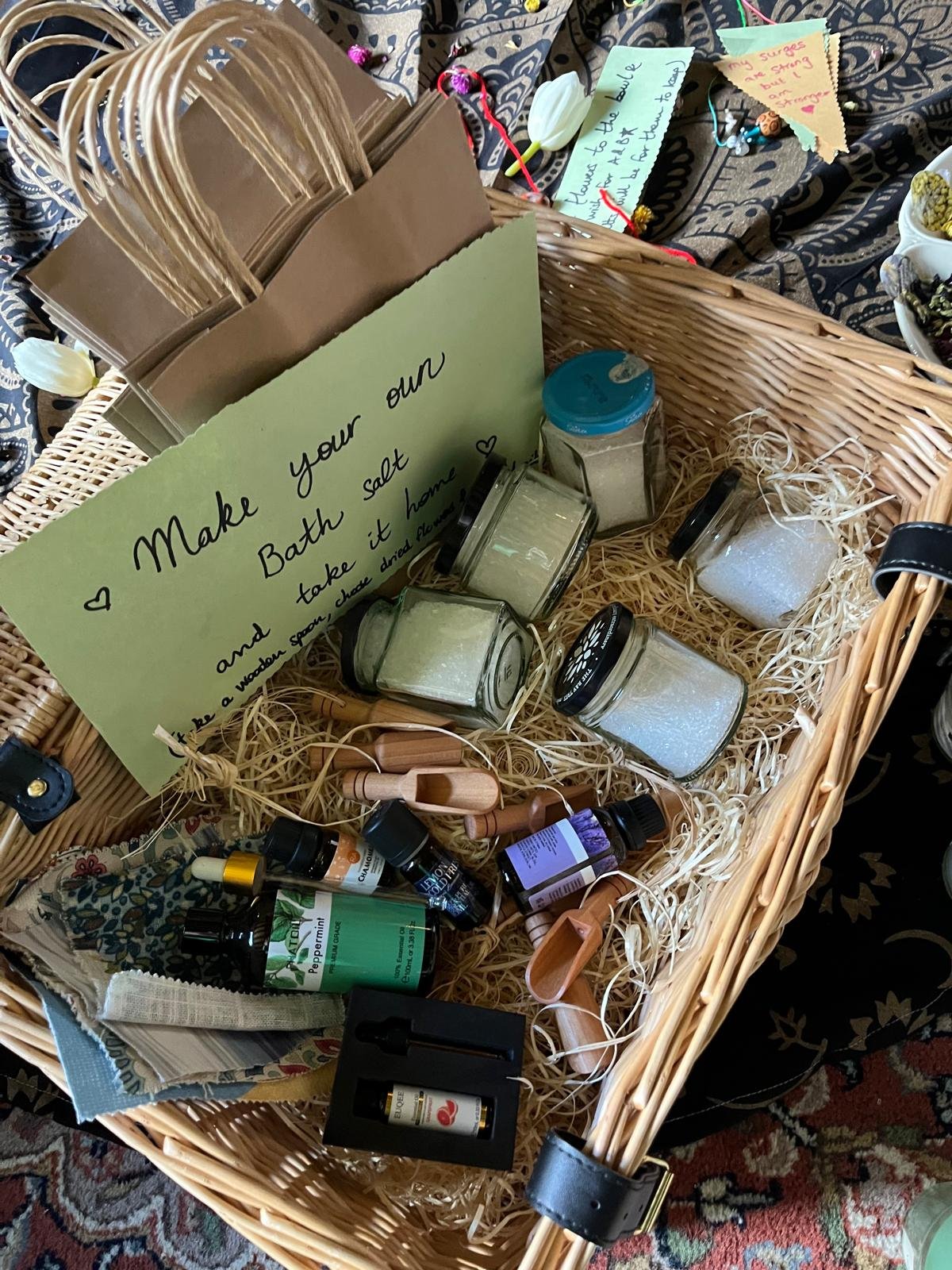 Example activity at a mother blessing ceremony, hosted by Your Doula Aurelia. Making salts infused with oils, herbs and flowers for the expecting mother or birthing person