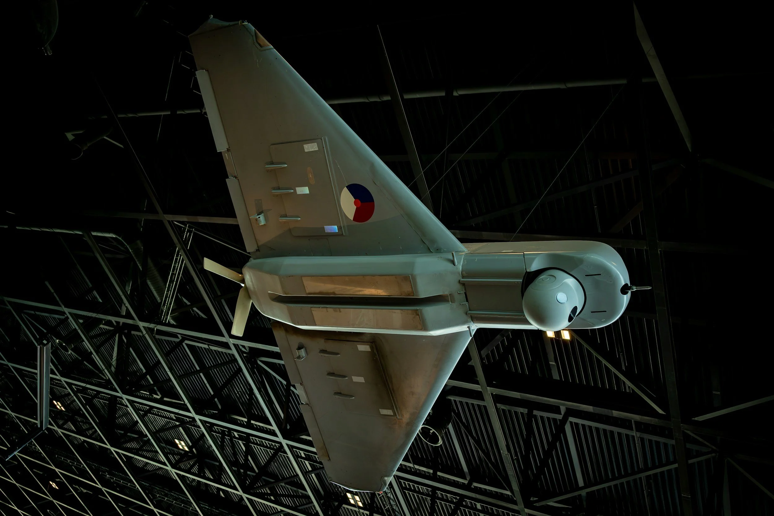 Close-up of a small drone system with fixed wing capability.