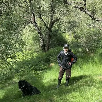 Billy the KRA mascot collie helping Jenn with surveying at Torrisdale