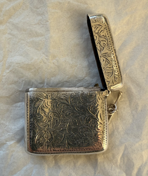 Larger than average sterling silver vesta case with side T-bar, assayed in Chester 1908