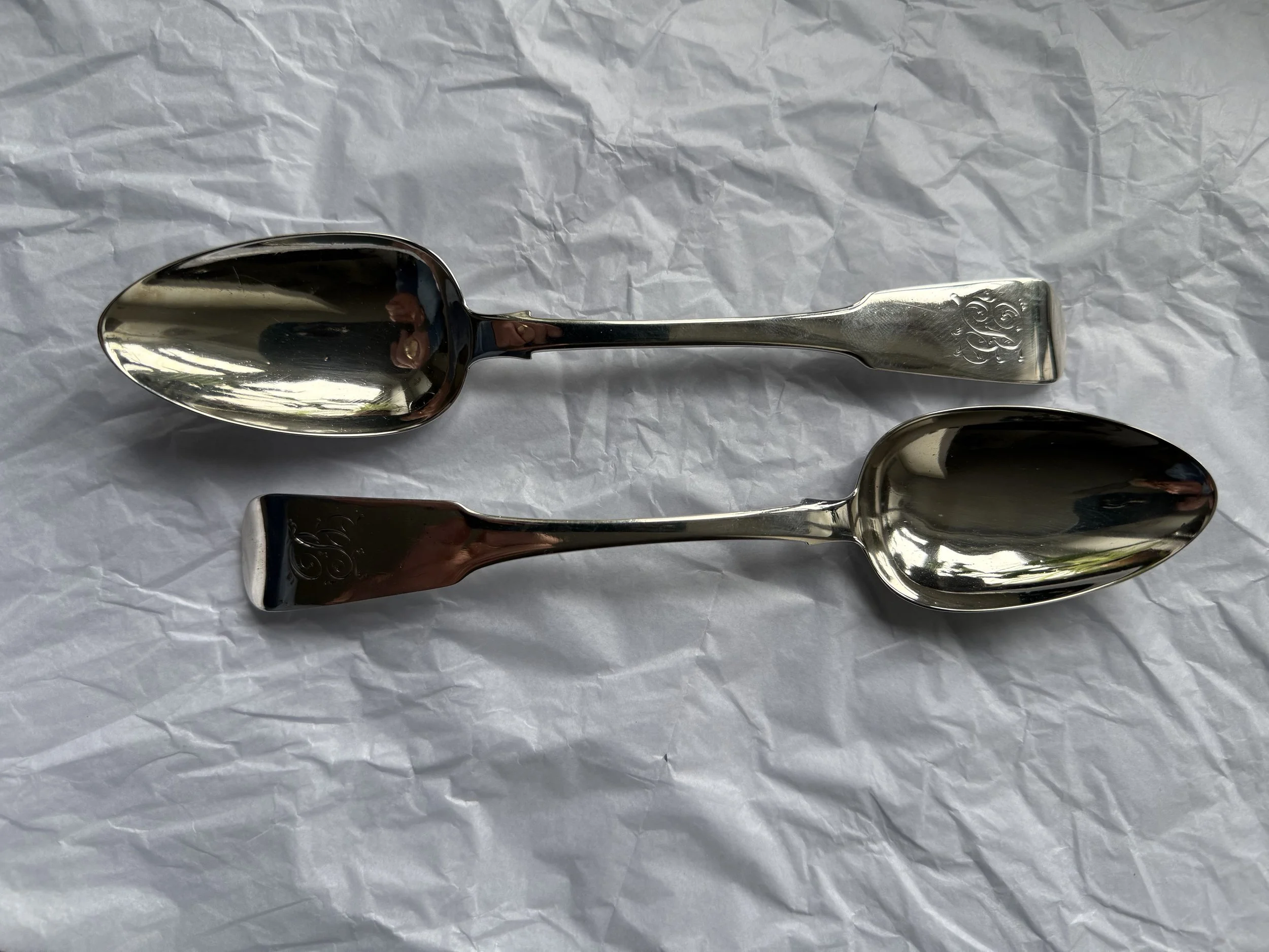 Very nice pair of George III Irish silver serving spoons in Hanoverian style with single-letter “B” monogram. Made by James Scott, Dublin 1819–20.
