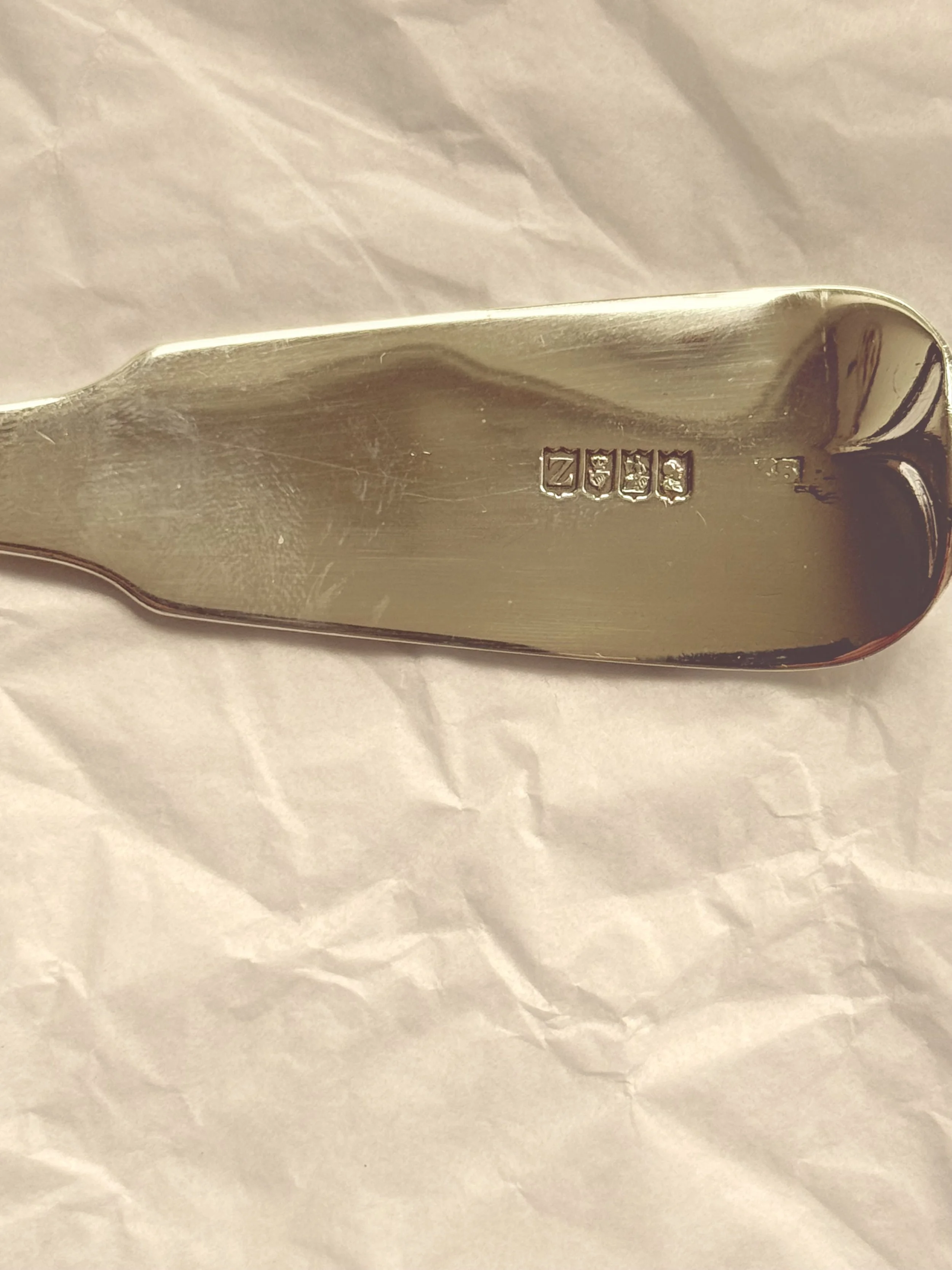 Silver spoon with showing hallmark 
