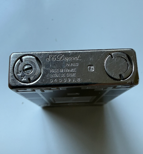 A vintage Art Deco-style cigarette lighter, c,1920-1930