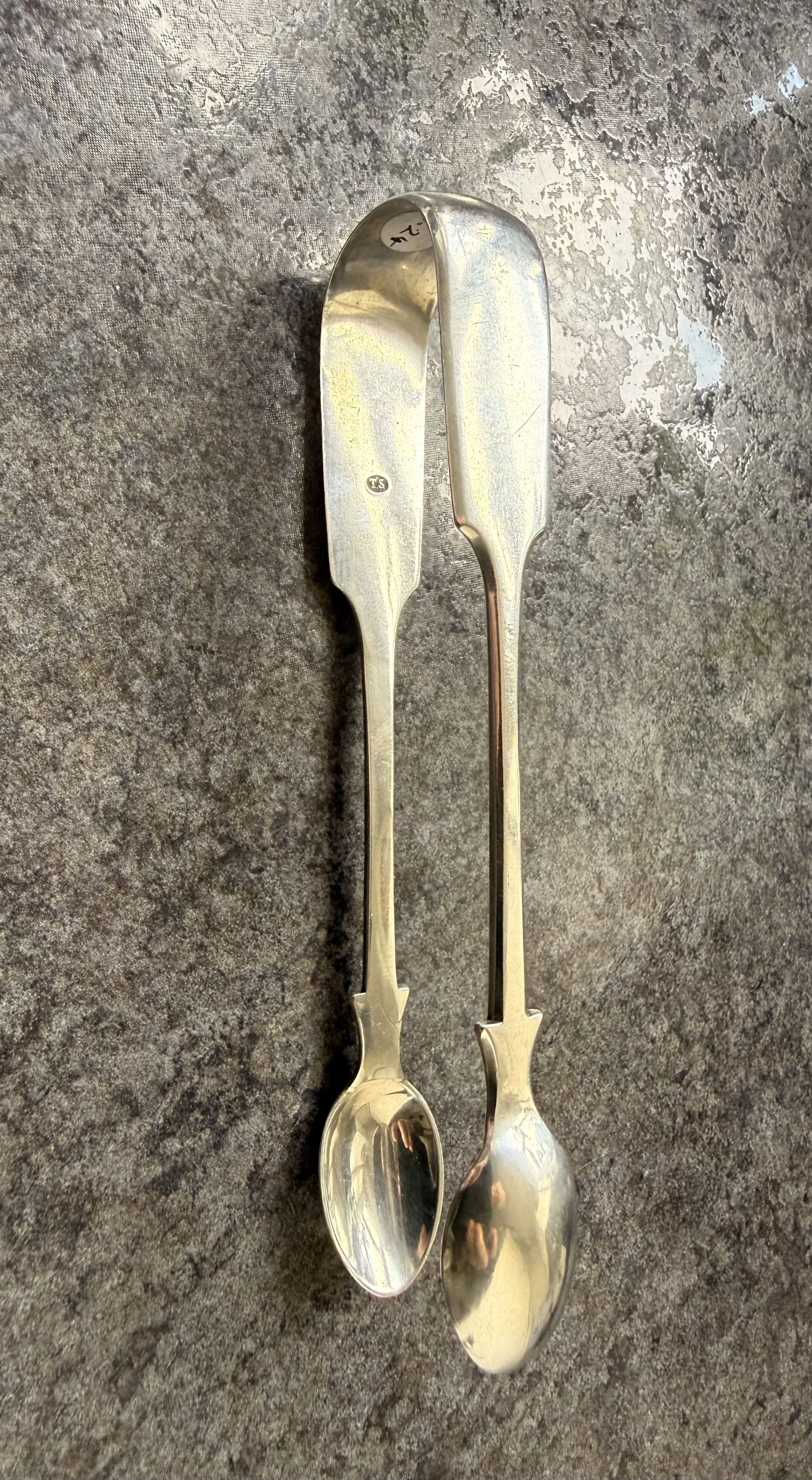 Rare Victorian sterling silver sugar tongs assayed in Exeter 1864 (the office closed in 1883).
A less common provincial assay mark.
