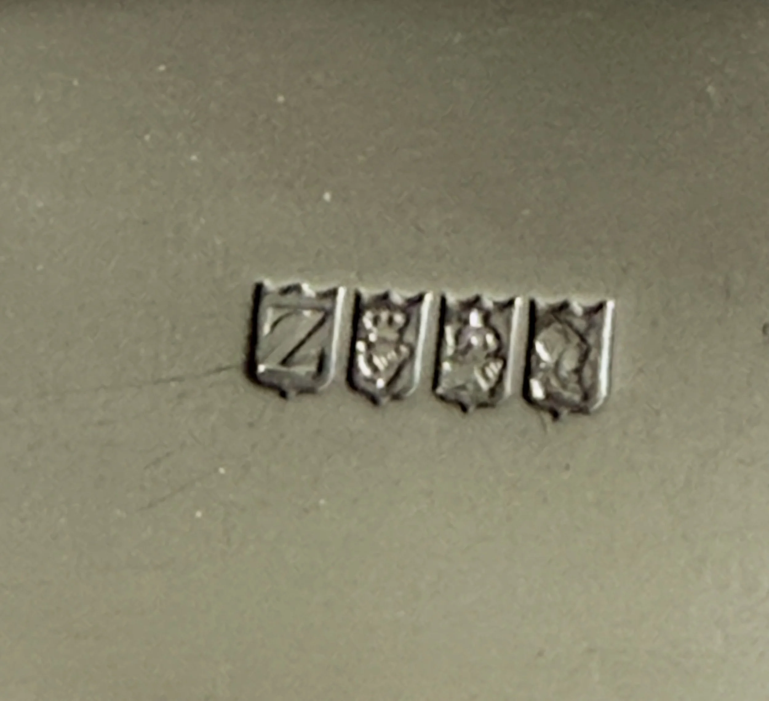 Silver spoon with showing hallmark 