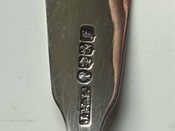 Maker's Mark (J.M.J.): Appears to be the sponsor's or silversmith's initials, which has been recorded on 19th-century Scottish and British provincial silver pieces (such as sauce ladles assayed in Glasgow 