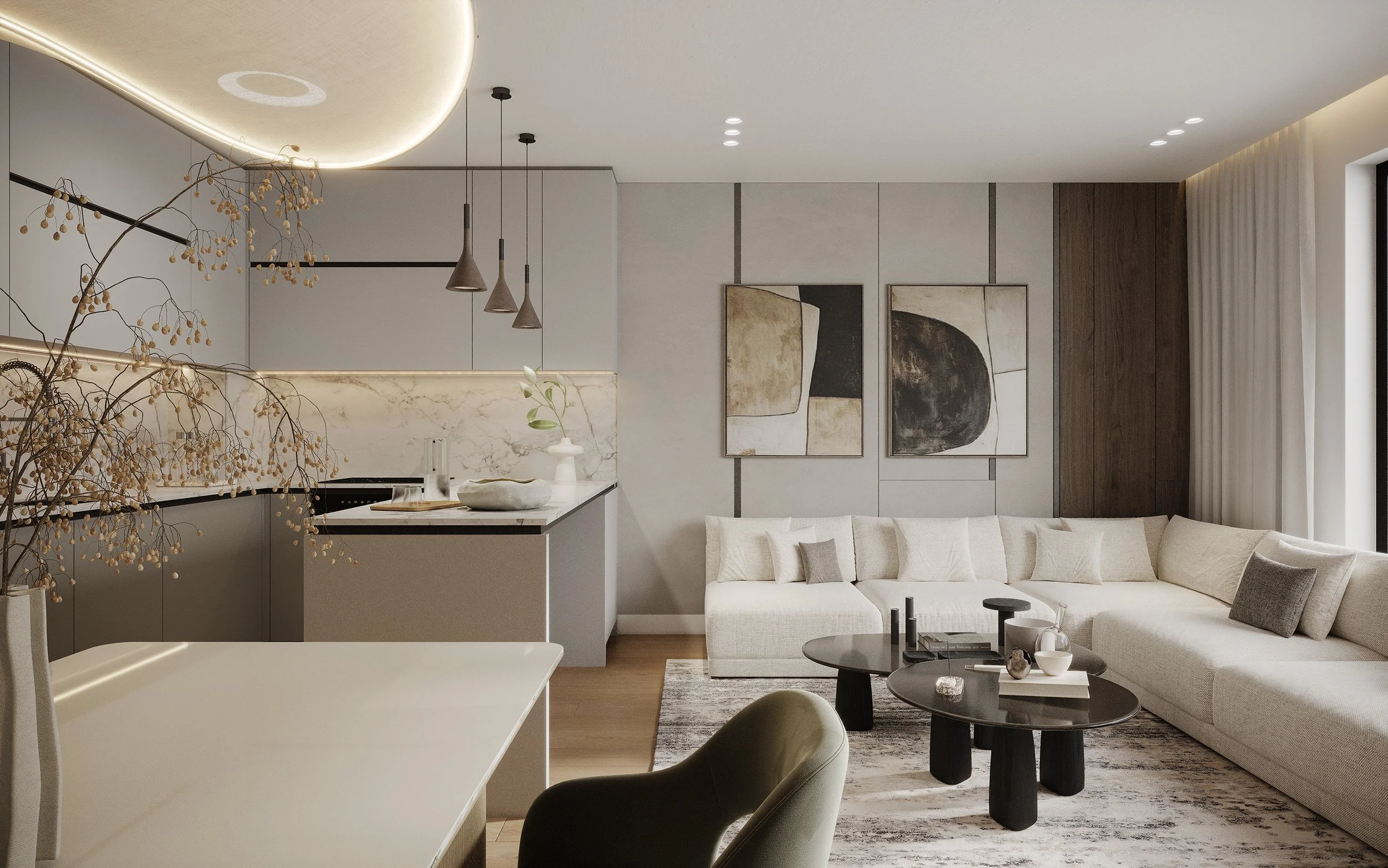 Modern living room with beige sectional sofa, abstract wall art, black coffee tables, and a kitchen with pendant lights and a marble backsplash.