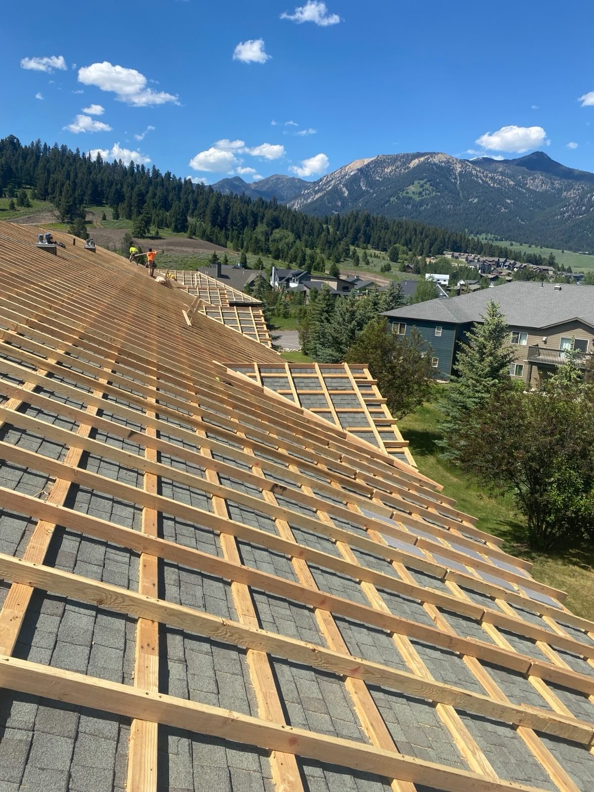 More and more sun is reminding us of these beautiful views from the summer!
Two stories up and exposed framing for this site visit at the Firelight Condos was precarous but the views were worth it!