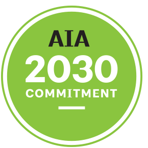 Green circular badge with black and white text stating 'AIA 2030 Commitment'.
