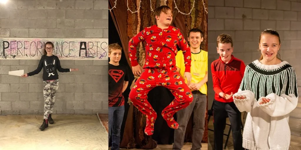Children performing on stage, one dressed as Batman, and a girl in pajamas jumping in the center.