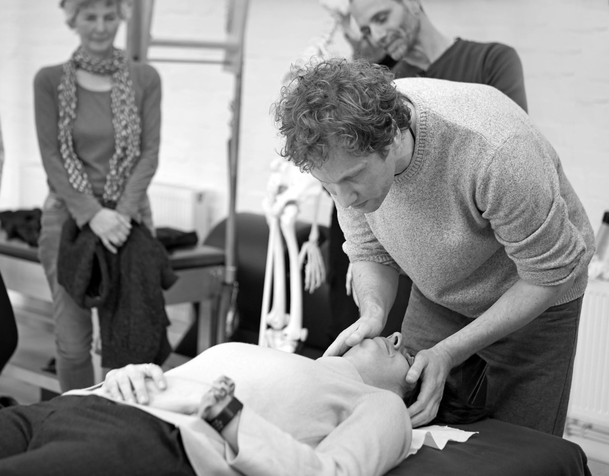 Robert Smith Bowen Therapist demonstrating on a patient at a seminar