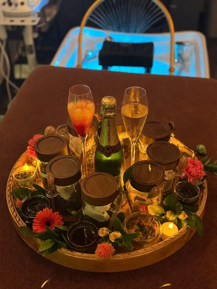 Champagne, tea and candlelit tray for the Aurora Crown Ritual
