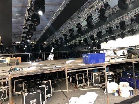 Empty stage with lighting and equipment in a concert or event venue