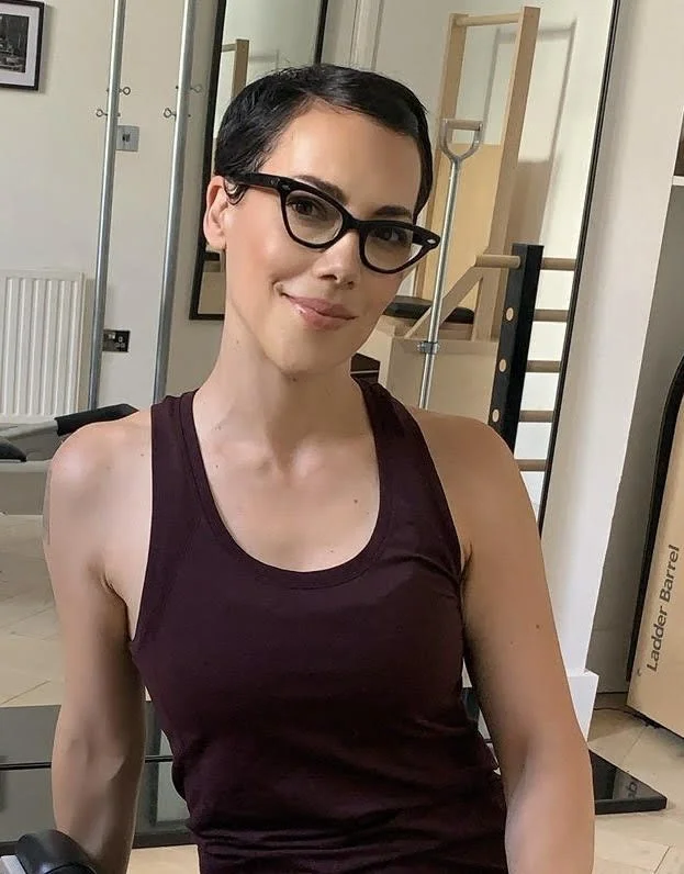 Classical Reformer Pilates instructor providing one-to-one coaching during a private session at Cobbled Yard Personal Training in Stoke Newington.