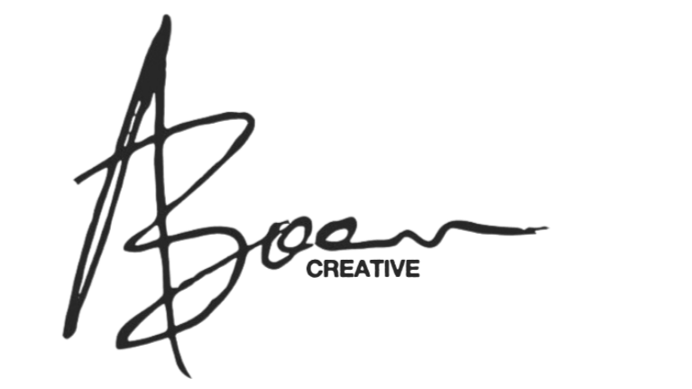 Black and white logo with a stylized signature and the words 'Creative' underneath.